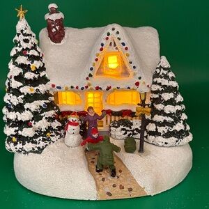 Festive Thomas Kinkade Hero’s Welcome Holiday Village House Teleflora